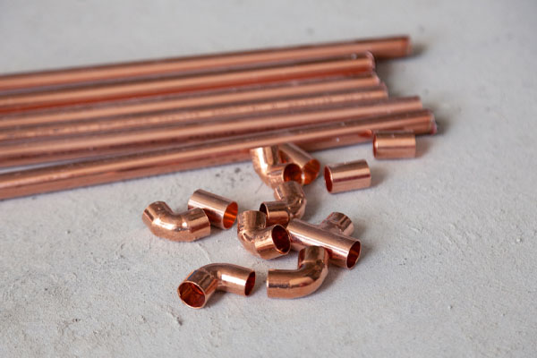 image of copper pipes depicting copper plumbing pipe corrosion