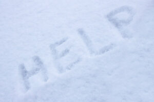 the word help in snow depicting how to winter-related plumbing problems