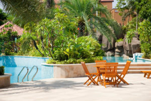 outdoor patio with pool and outdoor plumbing