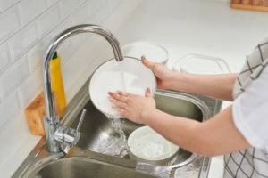 washing dishes and breaking plate