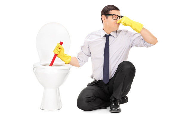 image of a man plunging a clogged toilet