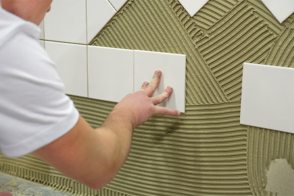 image of tile adhesive cement in bathroom