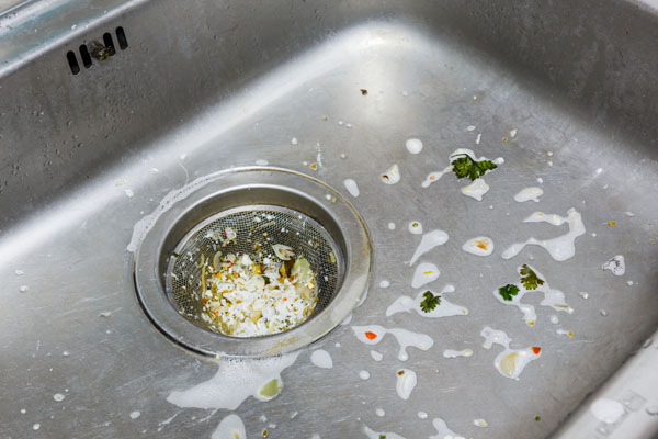 image of a clogged kitchen sink