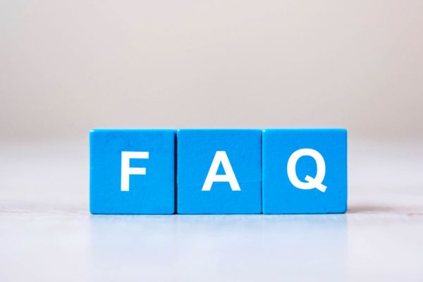 FAQ spelled using letters on a blue plastic dice depicting Household Water Consumption questions
