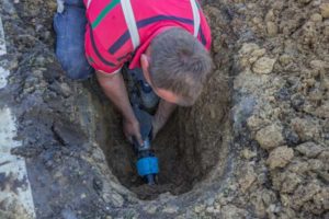 image of a water main repair and water main break