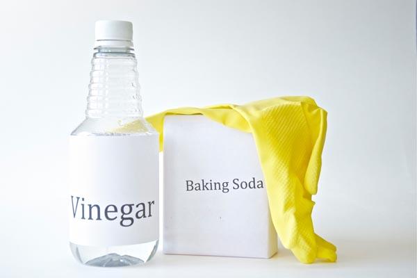 image of baking soda and vinegar to clean garbage disposal