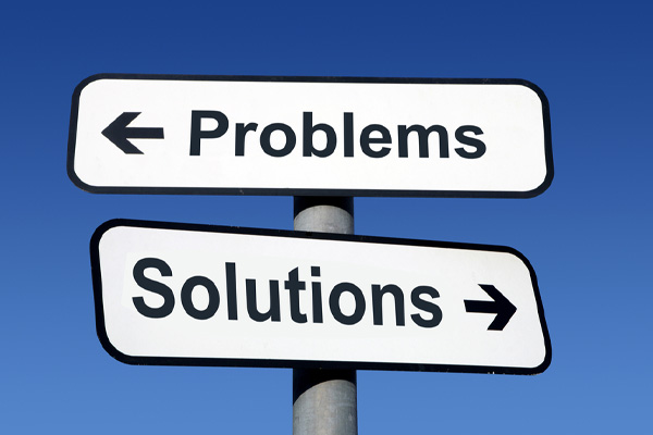 image of problem solutions sign depicting how to avoid plumbing problems