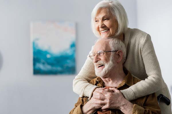 image of elderly couple discussing how to pick a toilet for seniors