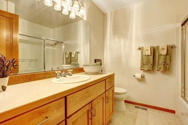 image of an outdated bathroom and sink