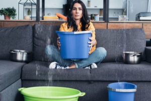 image of a homeowner waiting for an emergency plumbing repair