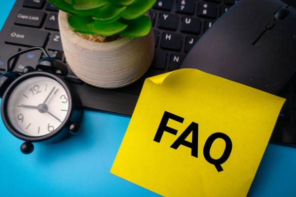 FAQ written on a neon yellow sticky note depicting Sump Pump Installation questions