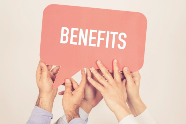 hands holding speech bubble cutout that says BENEFITS depicting Plumbing Pipe Insulation