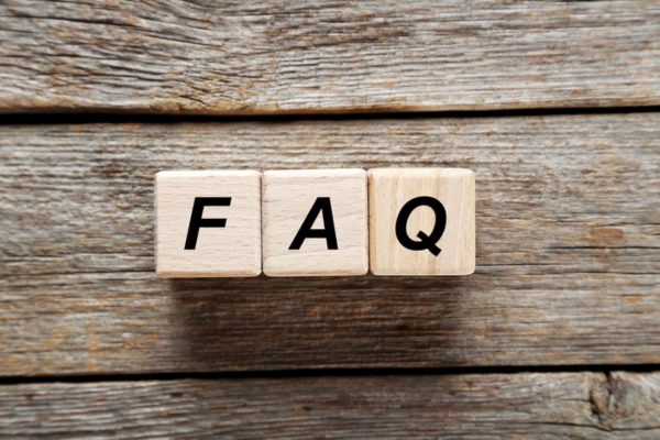 FAQ spelled using wooden letter cubes depicting Spring Plumbing Leaks questions