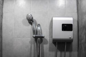 tankless water heater beside a shower